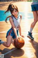 A woman in a blue and white uniform holding a basketball.